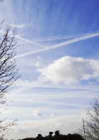 vapour trails criss-crossing the sky