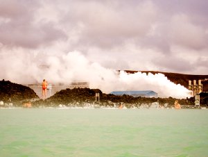 geothermal heating plant in Iceland with swimming pool in foreground