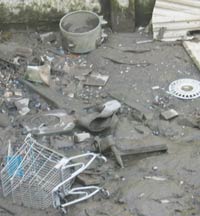 dumped items at low tide in the river Orwell